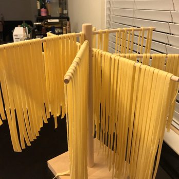 Cook Eat Italian - Pasta drying on the rack - Cooking Schools Near Me - Florence, FI Cook Eat Italian - Pasta drying on the rack - Cooking Schools Near Me - Florence, FI