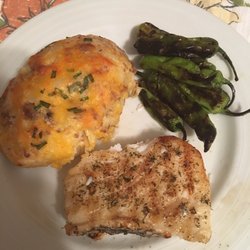 Heinen's Grocery Store - Chilean sea bass, twice baked potato from the prepared foods counter and shishito peppers. Made for an excellent meal.