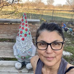 Love Your Way To Health - Visiting my sister in Dallas, I painted her garden gnomes nose and hat to bring some color and joy when we look out the window!