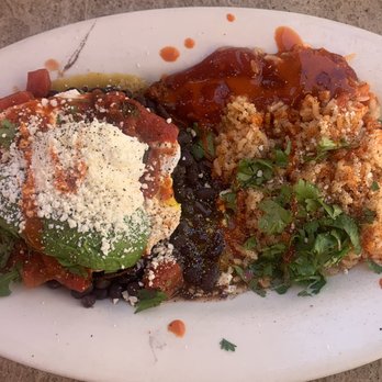 Bella Bru Cafe - Huevos Rancheros with chorizo and cilantro  rice and more cilantro - Cafes Near Me - Sacramento, California