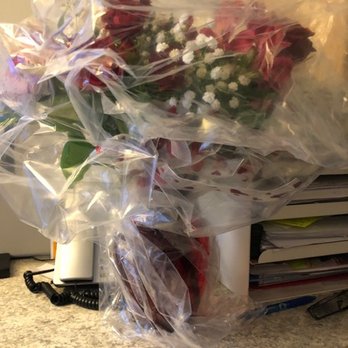 PJ's Flowers & Weddings - No clue why she left the wrapping up on this pic. - Florists Near Me - Bedford, New Hampshire PJ's Flowers & Weddings - No clue why she left the wrapping up on this pic. - Florists Near Me - Bedford, New Hampshire