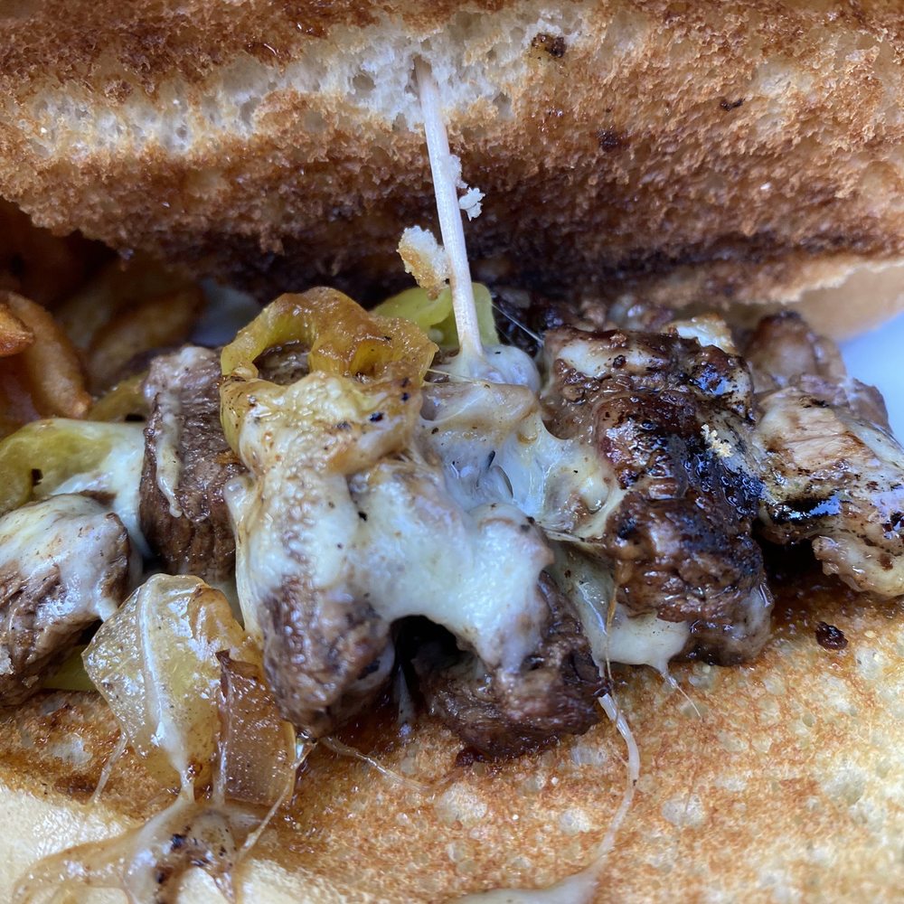 Mario's Fishbowl - Filet Tip Hoagie - close up - American Near Me - Morgantown, West Virginia Mario's Fishbowl - Filet Tip Hoagie - close up - American Near Me - Morgantown, West Virginia