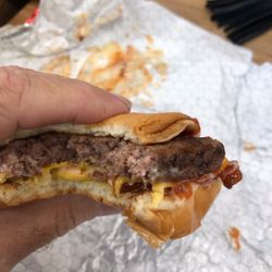 Wendy's - This is the Baconator we received. Clearly they are reducing ingredients to fatten their bottom line.