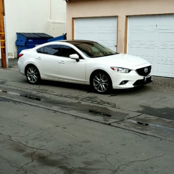 High Tech Foreign Auto Care - Gloss black vinyl roof wrap - Auto Repair Near Me - La Habra, California High Tech Foreign Auto Care - Gloss black vinyl roof wrap - Auto Repair Near Me - La Habra, California