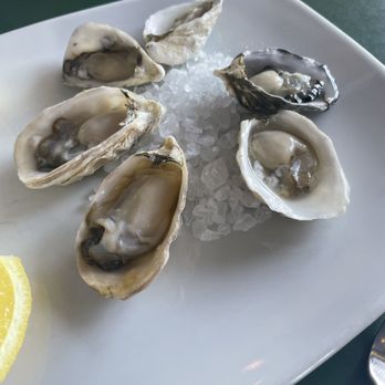 Place Pigalle - Oysters on the Half Shell - French Near Me - Seattle, Washington Place Pigalle - Oysters on the Half Shell - French Near Me - Seattle, Washington