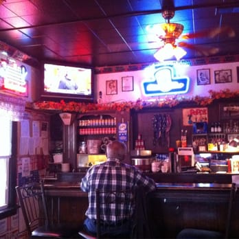 Denny's Lux Club - a man sitting at the bar - Bars Near Me - Dubuque, Iowa Denny's Lux Club - a man sitting at the bar - Bars Near Me - Dubuque, Iowa