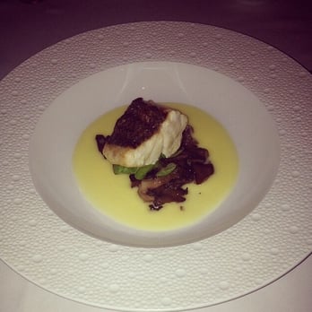 Charleston - Rockfish with mushrooms beurre blanc sauce. - New American Near Me - Baltimore, Maryland