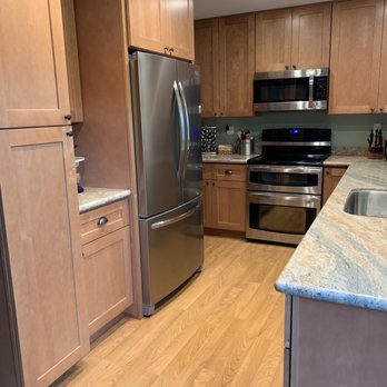 Elegant Stone & Cabinets - Surround around the fridge really looks great! - Kitchen & Bath Near Me - Walnut Creek, California Elegant Stone & Cabinets - Surround around the fridge really looks great! - Kitchen & Bath Near Me - Walnut Creek, California