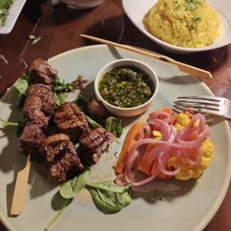 Lamb Skewer,.. wonder how they get the grill marks without burning the wooden skewers?