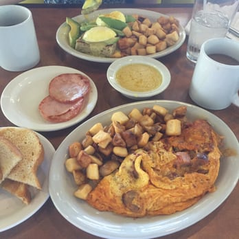 Sunnyside Breakfast Lounge - Butcher's choice omelet with sourdough toast and Plain Jane benedict with Canadian bacon on the side - Breakfast & Brunch Near Me - Mesa, Arizona Sunnyside Breakfast Lounge - Butcher's choice omelet with sourdough toast and Plain Jane benedict with Canadian bacon on the side - Breakfast & Brunch Near Me - Mesa, Arizona