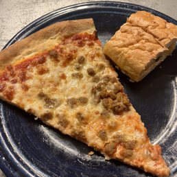 A slice of pizza and Garlic Bread with Cheese A slice of pizza and Garlic Bread with Cheese