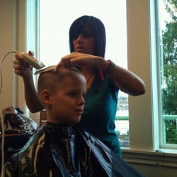 Jen Lucero working on a clipper cut
