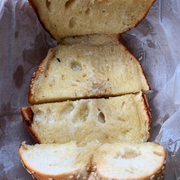 Sesame seed bagel toasted with butter. Sesame seed bagel toasted with butter.