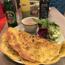 Onam - BÁNH XÈO 15 € Vietnamese crepes served with fresh herbs and home-made dipping sauce