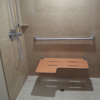 DoubleTree by Hilton Fullerton - Accessible shower with bench down. - Hotels Near Me - Fullerton, California DoubleTree by Hilton Fullerton - Accessible shower with bench down. - Hotels Near Me - Fullerton, California