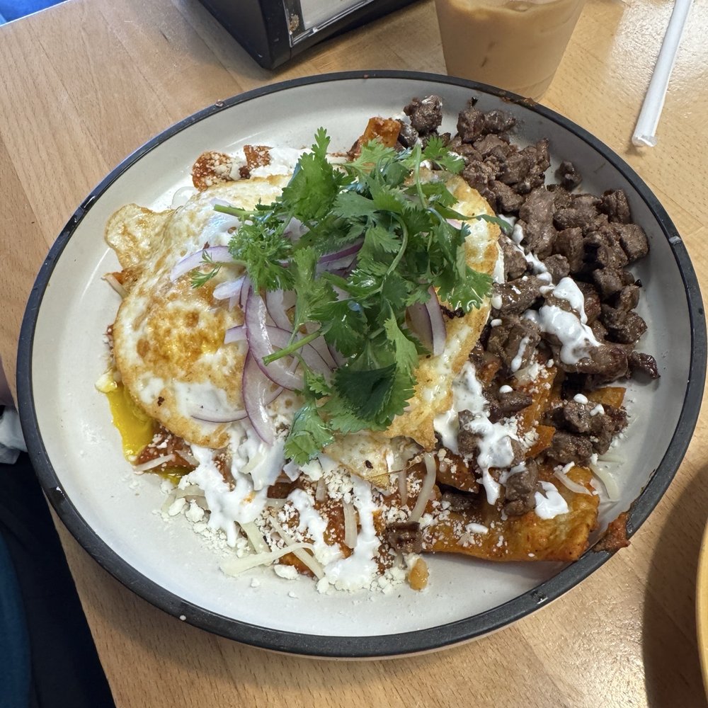 SeD Cocina - Chilaquiles with red salsa. Added carne asada - Mexican Near Me - Montclair, California SeD Cocina - Chilaquiles with red salsa. Added carne asada - Mexican Near Me - Montclair, California