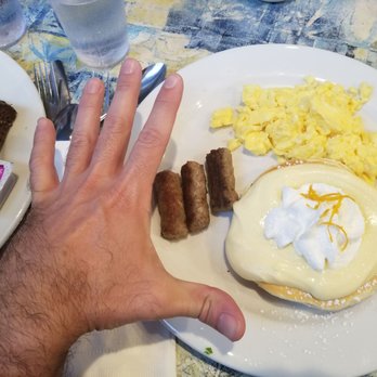 Moke's Bread & Breakfast - This is the reduced size of pancakes if you get the special, basically 1/4 the size of a normal one (hand for comp size). - Breakfast & Brunch Near Me - Kailua, Hawaii