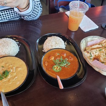 Tarka Indian Kitchen - Left to right: Chicken Korma, Chicken Tikka Masala, Garlic Naan - Indian Near Me - Houston, Texas Tarka Indian Kitchen - Left to right: Chicken Korma, Chicken Tikka Masala, Garlic Naan - Indian Near Me - Houston, Texas