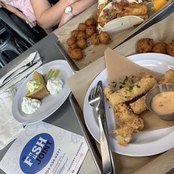 The Fish Joint - Little Bites Mahi Fingers, side of cole slaw, side of hush puppies. Fried Cod taco platter, homemade Key Lime Pie - Seafood Near Me - Coconut Creek, Florida