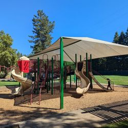 Bradford Park - Shade structure and individual restrooms for male and female. Parking in the paved parking lot and in the dirt adjacent to the road.