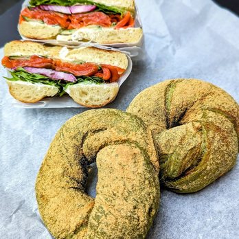 WA-BAGEL - a bagel and a sandwich on a table - Bagels Near Me - Vancouver, British Columbia WA-BAGEL - a bagel and a sandwich on a table - Bagels Near Me - Vancouver, British Columbia