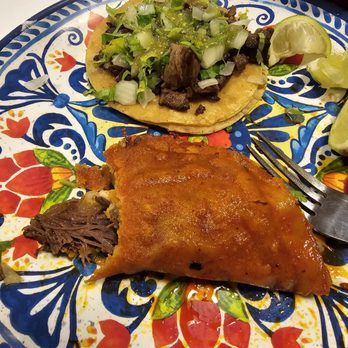 Tacotlan - A carne asada taco and a quesabirria taco - Mexican Near Me - Chicago, Illinois Tacotlan - A carne asada taco and a quesabirria taco - Mexican Near Me - Chicago, Illinois