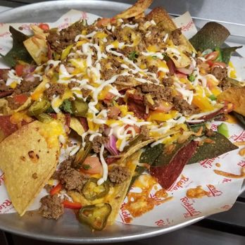 RP Social Club - a plate of nachos - Pubs Near Me - Edmonton, Alberta RP Social Club - a plate of nachos - Pubs Near Me - Edmonton, Alberta