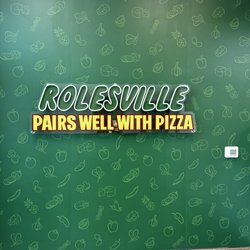 Papa John's indoor neon sign