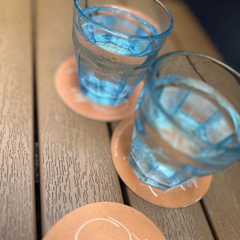 The Owl's Tail - two glasses of water on a table - Cocktail Bars Near Me - New York, New York