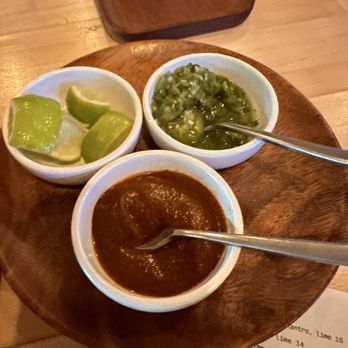 June - Sauces and limes with chicken al pastor - Mexican Near Me - Orlando, Florida June - Sauces and limes with chicken al pastor - Mexican Near Me - Orlando, Florida