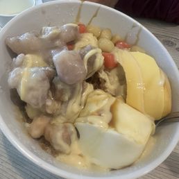 shaved ice with almond tofu, flan, condensed milk, taro, and rice balls. really good!!!!
