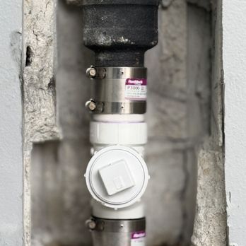 Brito Fix & Repair - Sewer line repair with new PVC cleanout installed to replace a damaged cast iron section. Professional repair completed successfully. - Plumbing Near Me Brito Fix & Repair - Sewer line repair with new PVC cleanout installed to replace a damaged cast iron section. Professional repair completed successfully. - Plumbing Near Me