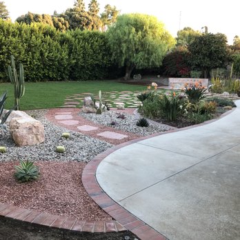 Paradise Landscaping - a garden with a stone path and cacti and succulents - Landscaping Near Me - Palos Verdes Estates, California Paradise Landscaping - a garden with a stone path and cacti and succulents - Landscaping Near Me - Palos Verdes Estates, California