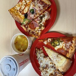two slices of pizza and a drink two slices of pizza and a drink