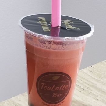TeaLatte Bar - Rose black tea with milk. Looks more like a green tea with very little milk. There are curds in my drink. Stay away from this place! - Bubble Tea Near Me - Frisco, Texas