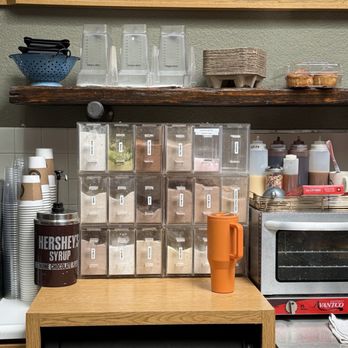Cowboy Joe - The powder station: a wall of flavors ready to transform any espresso into a masterpiece, from spiced chai to rich cocoa. - Coffee & Tea Near Me - Elko, Nevada