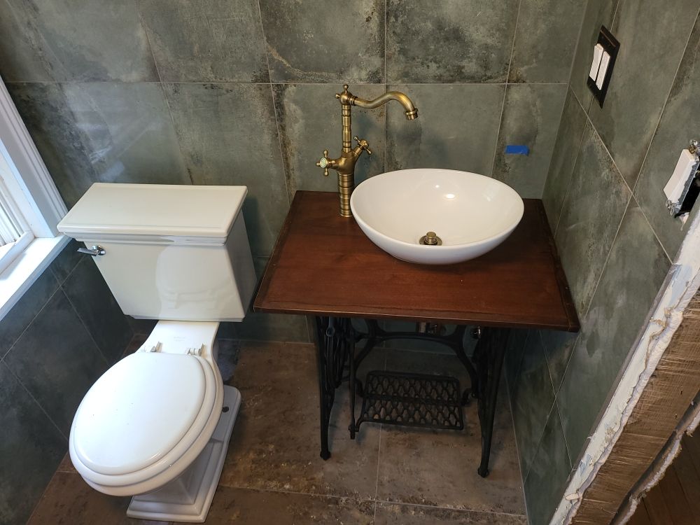 Slide of The Guild Plumbing & Heating