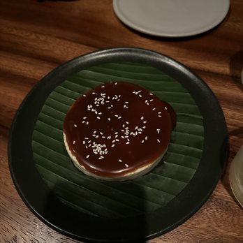 Damian - Banana flan   with caramel and sesame seeds.  We are not big fans of caramel so we scraped it off. But still a very delicious dessert. - Mexican Near Me - Los Angeles, California
