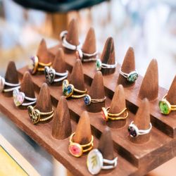 Jungle Relics - Handmade botanical rings by local artists, featuring pressed flowers and natural stones set in unique, nature-inspired designs.