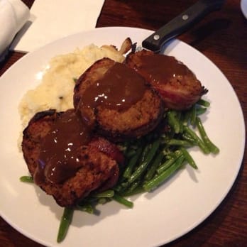Brass Monkey - $12 for the best meatloaf I've eaten. It's got beef, pork, & veal. It's wrapped in bacon. It's got cheesy mash and green beans! - Bars Near Me - Providence, Rhode Island