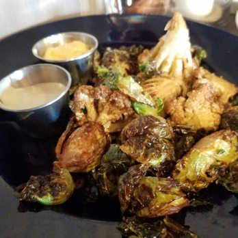 Third Street Social - Roasted brussel sprouts and cauliflower. Simple yet addictive! I like all vegetables roasted though, so I may be a bit biased. - Bars Near Me - Lee's Summit, Missouri Third Street Social - Roasted brussel sprouts and cauliflower. Simple yet addictive! I like all vegetables roasted though, so I may be a bit biased. - Bars Near Me - Lee's Summit, Missouri