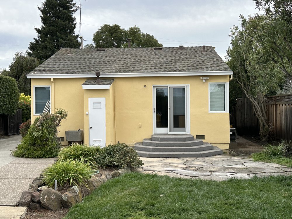 Slide of Umbrella Plastering & Roofing