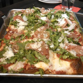 Pizza Rock - La Regina- vine ripened tomato sauce, mozzarella cheese, sopressatta, prosciutto, arugula, piave, and Parmigiano-Reggiano - Pizza Near Me - Henderson, Nevada Pizza Rock - La Regina- vine ripened tomato sauce, mozzarella cheese, sopressatta, prosciutto, arugula, piave, and Parmigiano-Reggiano - Pizza Near Me - Henderson, Nevada