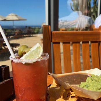 Nelson's - Bloody Mary with guacamole, salsa, and chips. Love that the Bloody Mary isn't overly salty. - Seafood Near Me - Rancho Palos Verdes, California