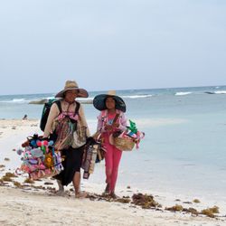 Grand Velas Riviera Maya - These ladies were a regular sight, walking up and down the resort beach, selling various colorful items. They were very polite.