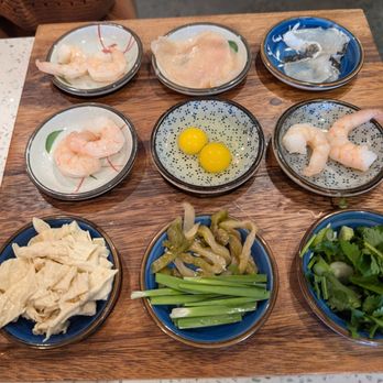 Order A1 - clear soup with rice noodles, all the sides(swapped pork for more shrimp).