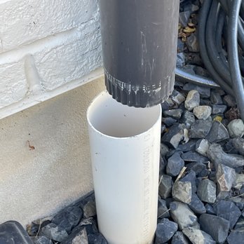 WE CARE! - HANDYMAN - Putting together the downspout to the PVC rainwater outlet - Handyman Near Me WE CARE! - HANDYMAN - Putting together the downspout to the PVC rainwater outlet - Handyman Near Me