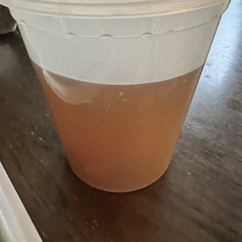 Buckeye Pho - Broth for the jumbo pho. I wish they at least filled up this container - Vietnamese Near Me - Columbus, Ohio