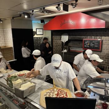 Juliana's - Cooking - Pizza Near Me - Brooklyn, New York