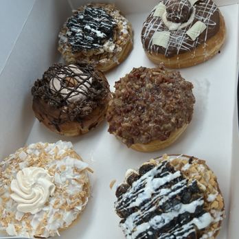 Mojo Donuts - The Elvis-marshmallow n PB. 1Coconut w/mango. 1-Bacon 1-Rocher chocolate 1-dulce de leche with puff crunch. All very fresh and amazing. - Donuts Near Me - Pembroke Pines, Florida